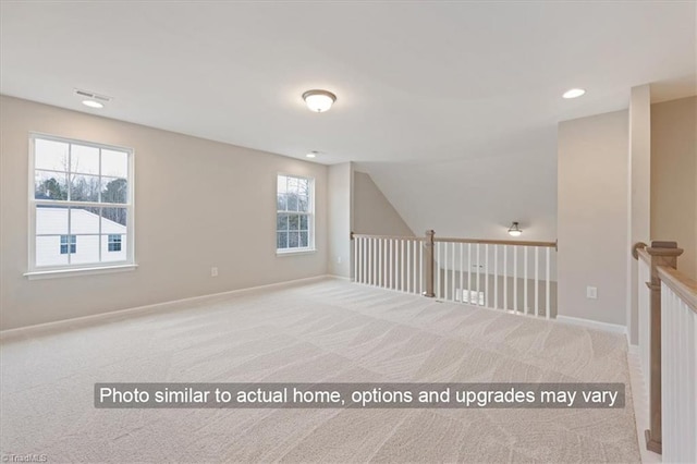 bonus room with visible vents, baseboards, and carpet floors