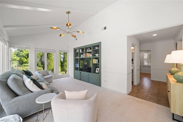 948 Kenleigh Cir, Winston-Salem, NC 27106 - tiled living area with a chandelier, plenty of natural light, beam ceiling, and high vaulted ceiling