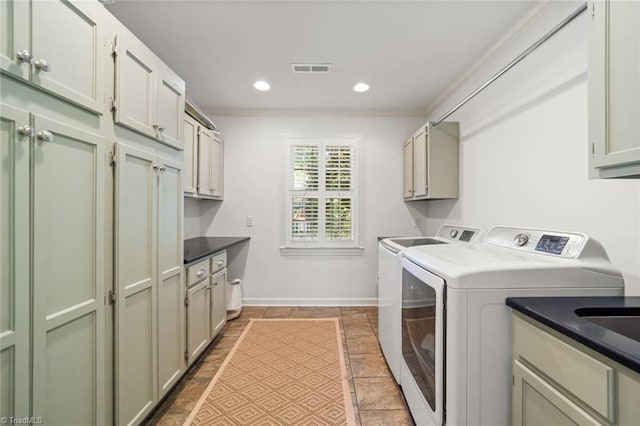 948 Kenleigh Cir, Winston-Salem, NC 27106 - laundry room featuring washer and clothes dryer, cabinet space, crown molding, and recessed lighting