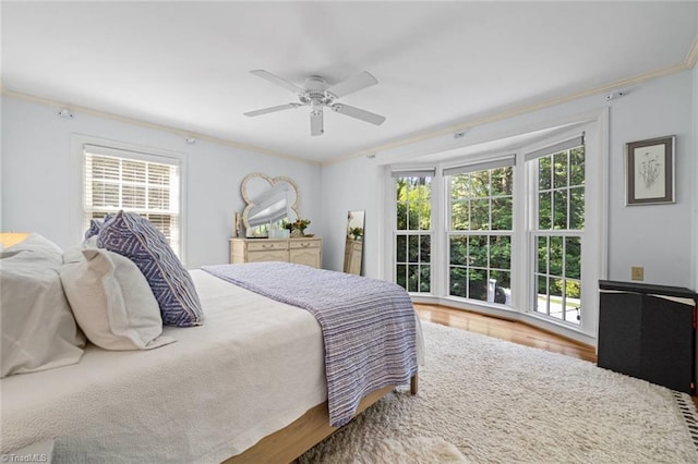 948 Kenleigh Cir, Winston-Salem, NC 27106 - bedroom with wood finished floors, crown molding, and ceiling fan