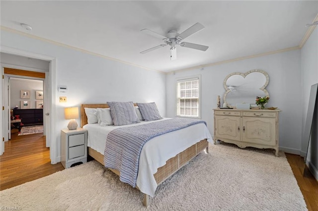 948 Kenleigh Cir, Winston-Salem, NC 27106 - bedroom featuring crown molding, light wood-style flooring, and ceiling fan