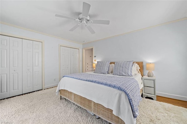 948 Kenleigh Cir, Winston-Salem, NC 27106 - bedroom featuring crown molding, multiple closets, and ceiling fan