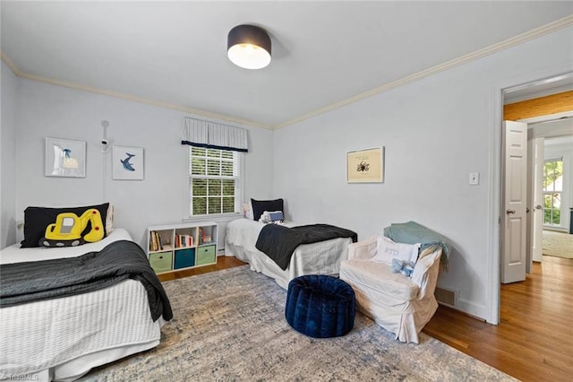 948 Kenleigh Cir, Winston-Salem, NC 27106 - bedroom with wood finished floors and ornamental molding