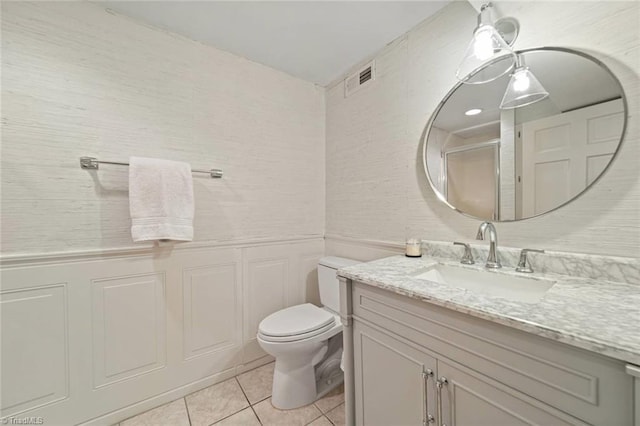 948 Kenleigh Cir, Winston-Salem, NC 27106 - full bath with vanity, tile patterned floors, a shower with shower door, and a wainscoted wall