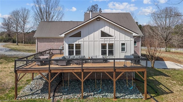 4420 Bunton Swaim Rd, Liberty, NC 27298 - rear view of house with an outdoor living space, board and batten siding, a lawn, and a deck