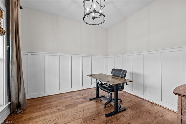 4420 Bunton Swaim Rd, Liberty, NC 27298 - home office with a chandelier, a wainscoted wall, and wood finished floors