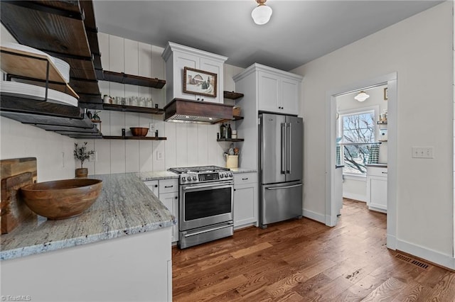 4420 Bunton Swaim Rd, Liberty, NC 27298 - kitchen with visible vents, dark wood finished floors, open shelves, white cabinets, and appliances with stainless steel finishes