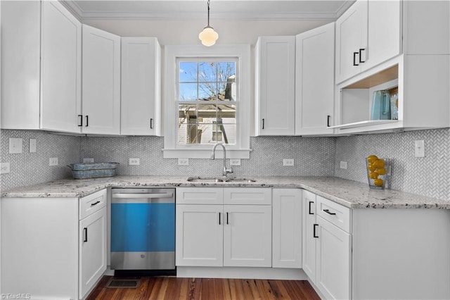 kitchen featuring a sink, white cabinets, and dishwasher