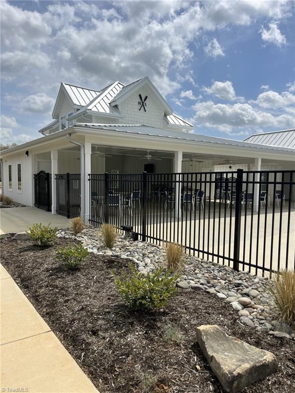 517 Raspberry Hill Rd, Winston-Salem, NC 27106 - view of front of property with a standing seam roof and metal roof