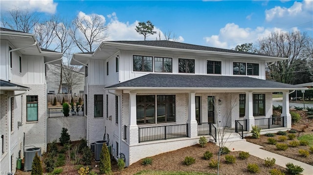 view of front facade featuring cooling unit and covered porch