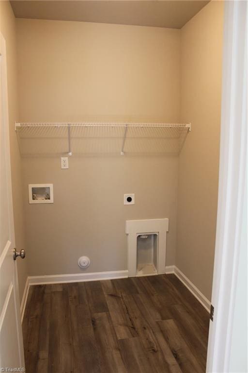 clothes washing area with dark hardwood / wood-style floors, hookup for a washing machine, and hookup for an electric dryer