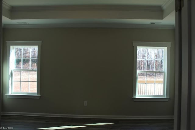 unfurnished room with crown molding