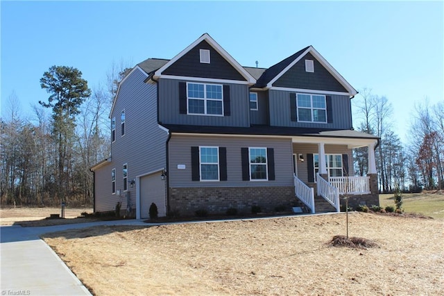 craftsman-style house with a garage and covered porch