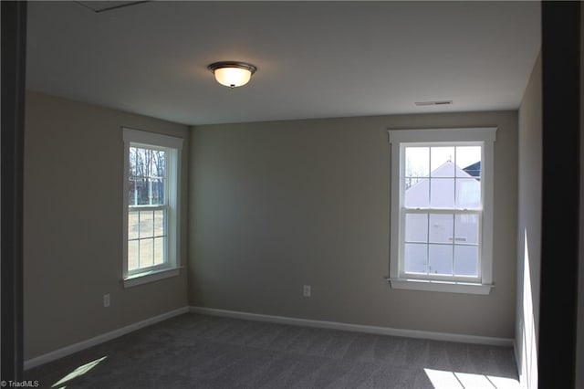 view of carpeted spare room