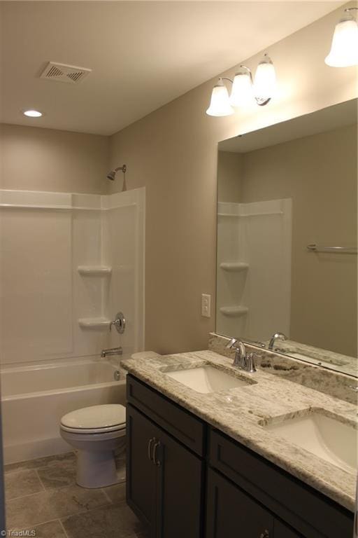 full bathroom featuring vanity, toilet, and tub / shower combination