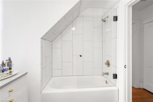 full bath with  shower combination and wood finished floors