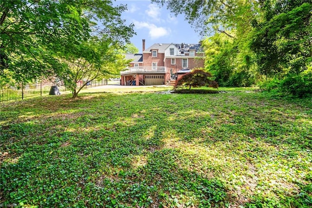 view of yard featuring fence