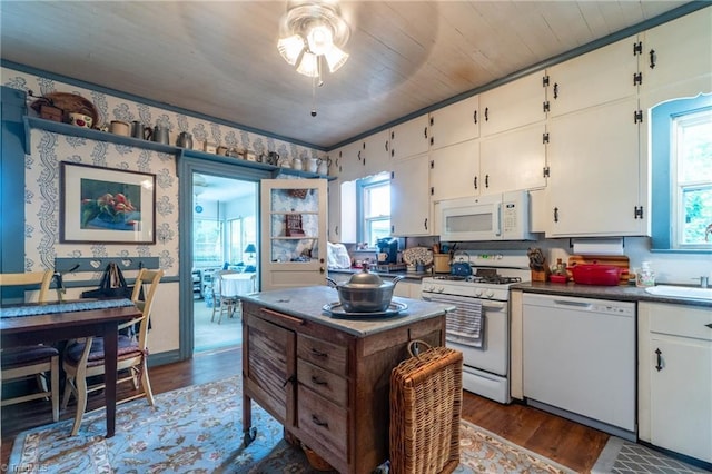 3775 Friendship Ledford Rd, Winston-Salem, NC 27107 - kitchen featuring dark countertops, white appliances, a ceiling fan, white cabinetry, and wood finished floors
