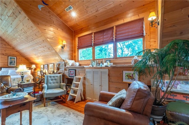 3775 Friendship Ledford Rd, Winston-Salem, NC 27107 - living area featuring visible vents, vaulted ceiling, wood walls, wood finished floors, and wooden ceiling