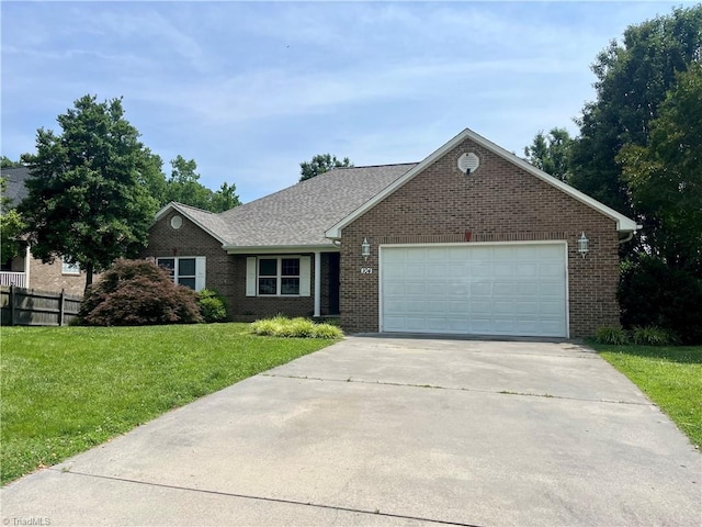 104 Autumn Hill Ct, Archdale, NC 27263 - view of front of property with brick siding, driveway, and a garage
