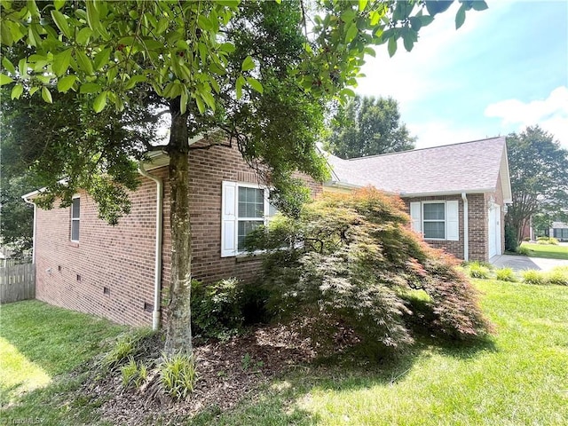 104 Autumn Hill Ct, Archdale, NC 27263 - view of side of home with brick siding, crawl space, and an attached garage