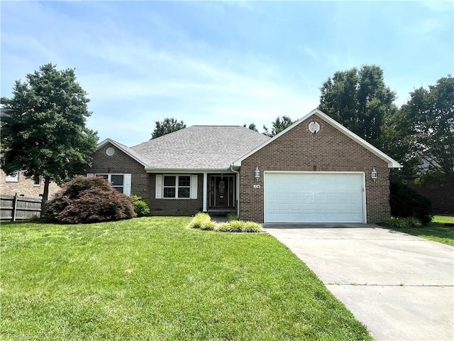 104 Autumn Hill Ct, Archdale, NC 27263 - view of front facade featuring brick siding, an attached garage, and concrete driveway