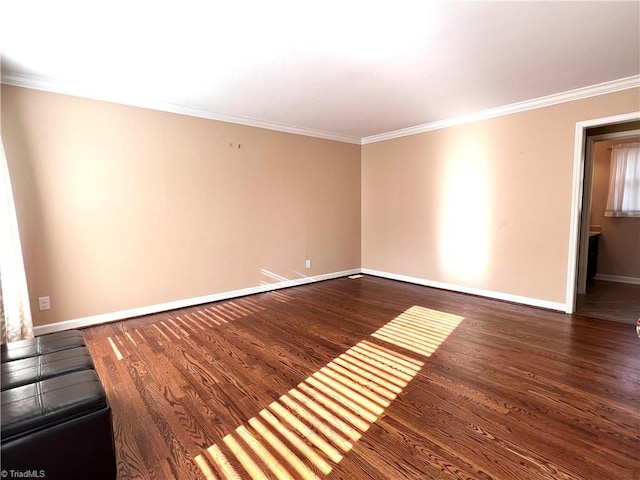 unfurnished room with dark hardwood / wood-style flooring and ornamental molding