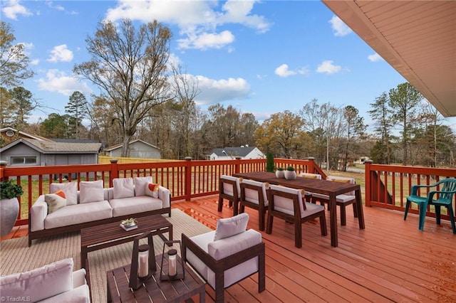 wooden terrace featuring an outdoor living space