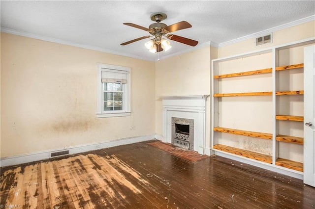 unfurnished living room featuring a high end fireplace, ceiling fan, ornamental molding, and dark hardwood / wood-style flooring