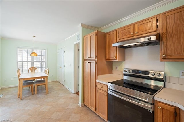 kitchen featuring baseboards, electric stove, under cabinet range hood, and light countertops