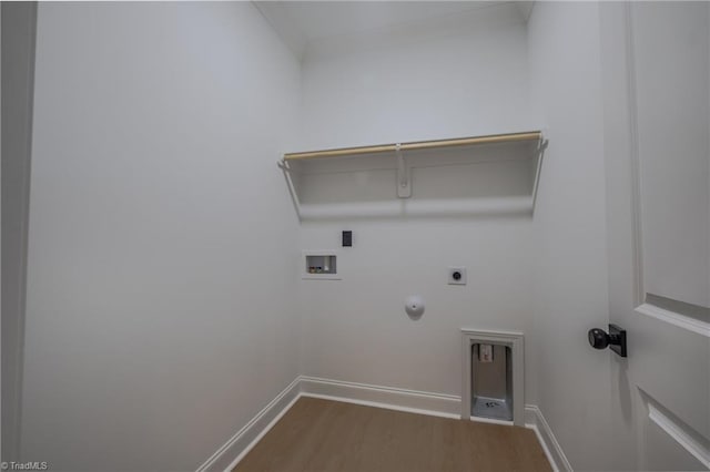 clothes washing area with wood finished floors, hookup for a gas dryer, hookup for an electric dryer, hookup for a washing machine, and laundry area