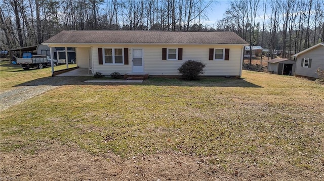 single story home featuring a carport and a front yard