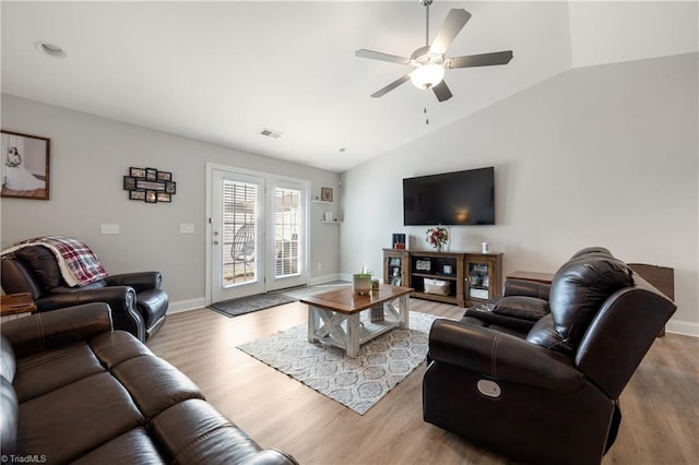 106 Oak Ridge Dr, Archdale, NC 27263 - living area with wood finished floors, ceiling fan, lofted ceiling, and baseboards