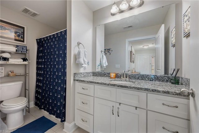 106 Oak Ridge Dr, Archdale, NC 27263 - bathroom featuring tile patterned flooring, toilet, vanity, baseboards, and curtained shower