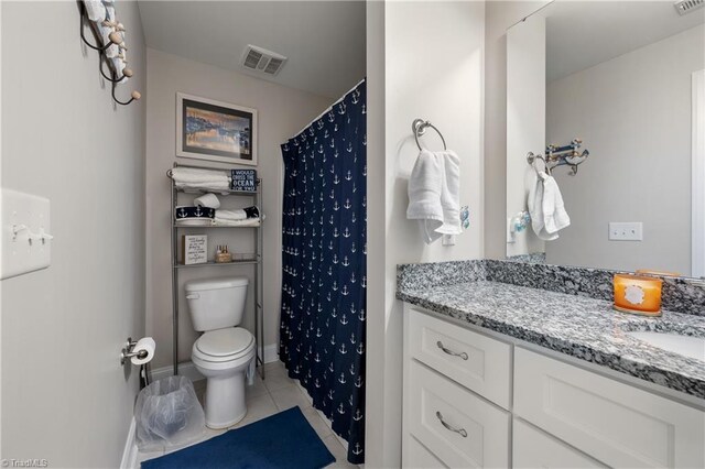 106 Oak Ridge Dr, Archdale, NC 27263 - bathroom featuring tile patterned flooring, vanity, toilet, baseboards, and a shower with shower curtain