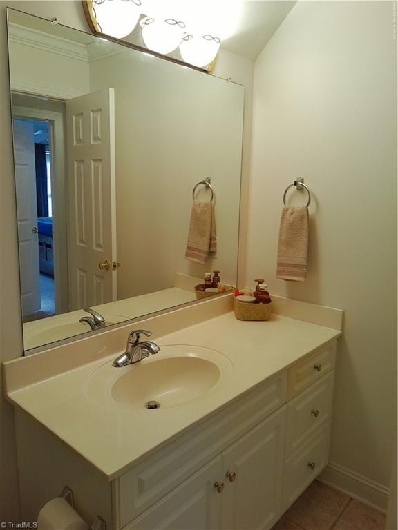 bathroom featuring tile patterned floors and vanity