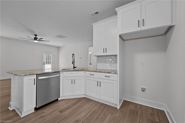 1329 Union Cross Rd, Kernersville, NC 27284 - kitchen featuring dishwasher, a sink, a peninsula, a ceiling fan, and light wood finished floors