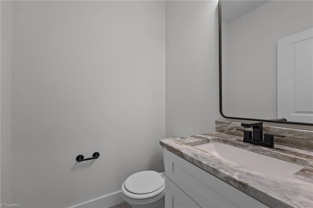 1329 Union Cross Rd, Kernersville, NC 27284 - half bath featuring toilet, vanity, and baseboards