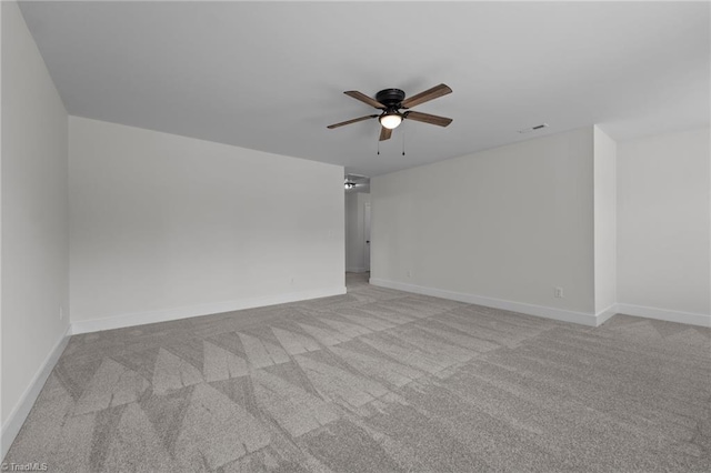 1329 Union Cross Rd, Kernersville, NC 27284 - spare room featuring a ceiling fan, light carpet, and baseboards