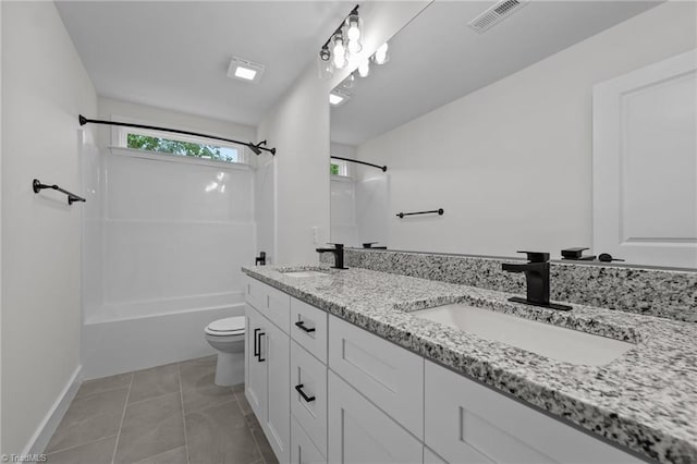 1329 Union Cross Rd, Kernersville, NC 27284 - full bath with shower / tub combination, toilet, double vanity, baseboards, and tile patterned floors
