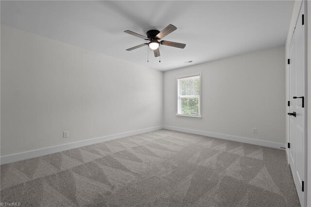 1329 Union Cross Rd, Kernersville, NC 27284 - carpeted empty room with a ceiling fan and baseboards