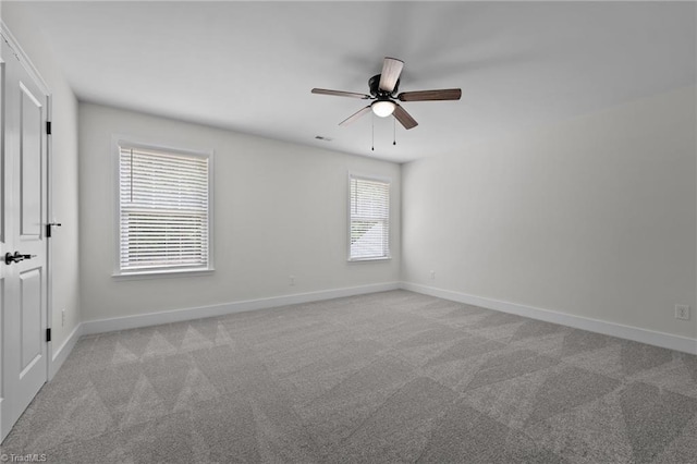 1329 Union Cross Rd, Kernersville, NC 27284 - spare room with a ceiling fan, carpet floors, and baseboards