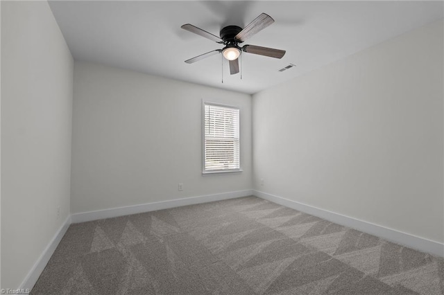 1329 Union Cross Rd, Kernersville, NC 27284 - spare room featuring carpet floors, a ceiling fan, and baseboards