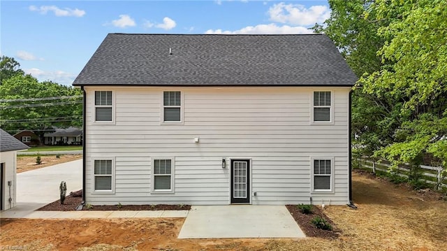 1329 Union Cross Rd, Kernersville, NC 27284 - back of property with a patio, fence, and roof with shingles