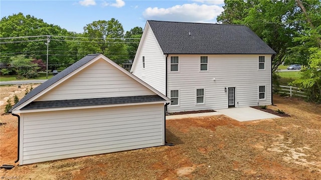 1329 Union Cross Rd, Kernersville, NC 27284 - back of property with a patio, a shingled roof, and fence
