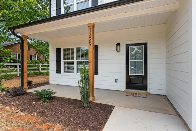 1329 Union Cross Rd, Kernersville, NC 27284 - view of exterior entry featuring fence and a porch