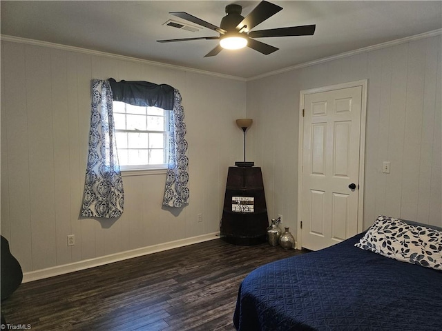 bedroom with crown molding, dark wood finished floors, baseboards, and ceiling fan