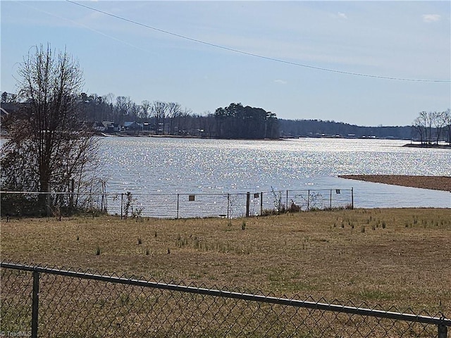 view of water feature with fence