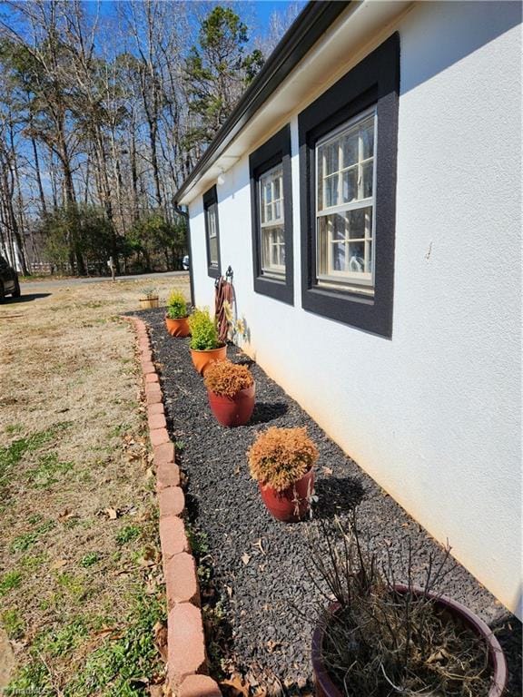 view of home's exterior with stucco siding