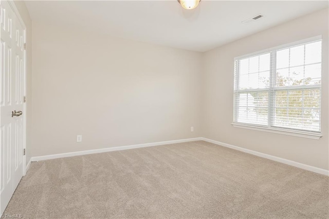 view of carpeted spare room